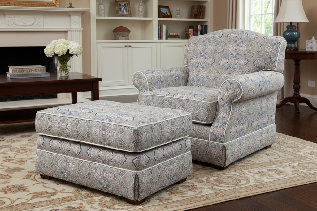 Traditional easy chair and ottoman with white piping